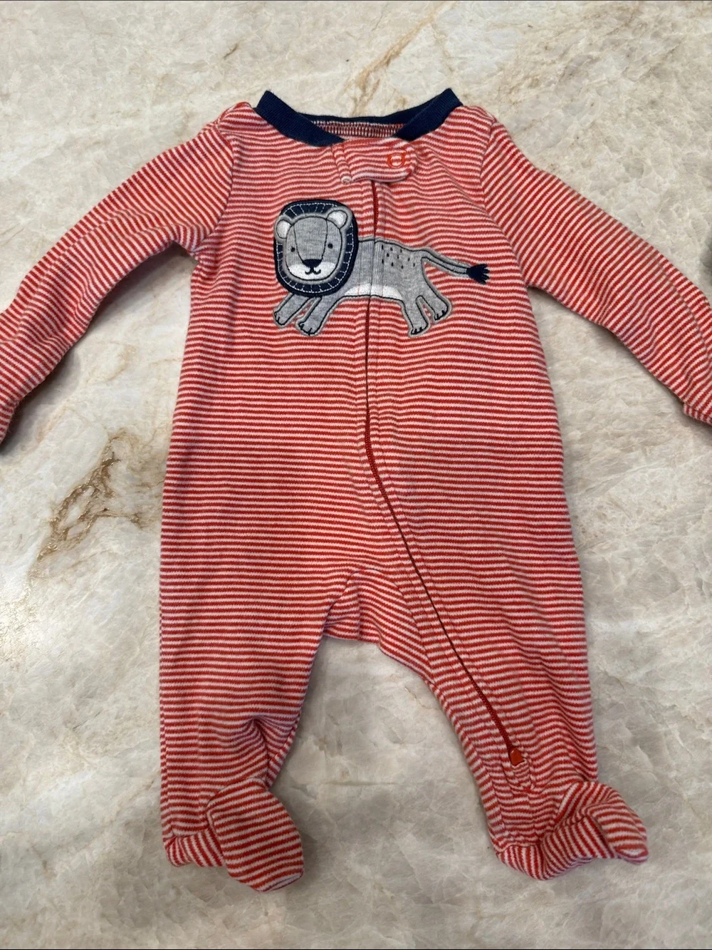 Carter’s baby clothes: 3 footie pajamas, 3 onesies newborn size